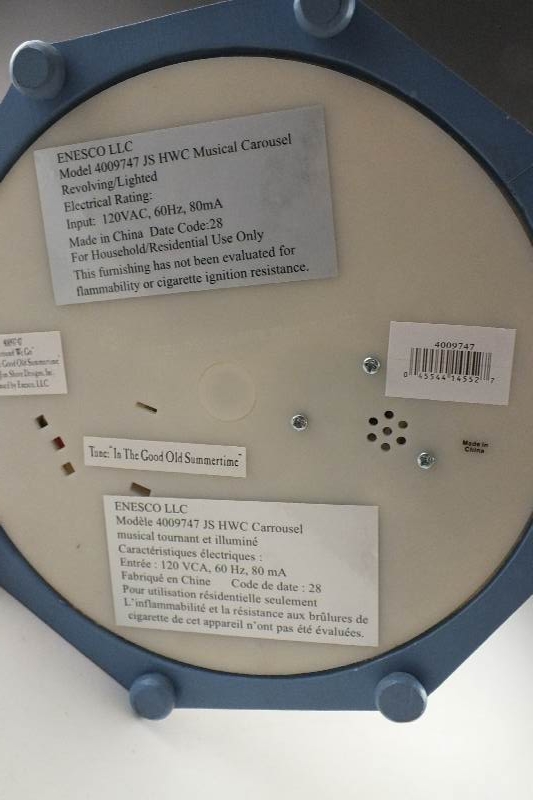 A 2008 Jim Shore "Around We Go" Musical Carousel with night light feature