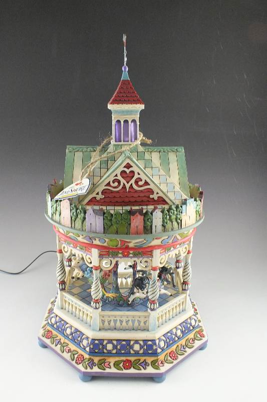 A 2008 Jim Shore "Around We Go" Musical Carousel with night light feature
