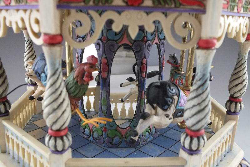 A 2008 Jim Shore "Around We Go" Musical Carousel with night light feature