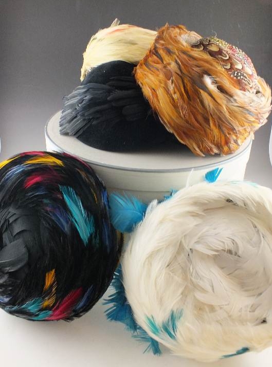 A collection of five vintage pill box style hats