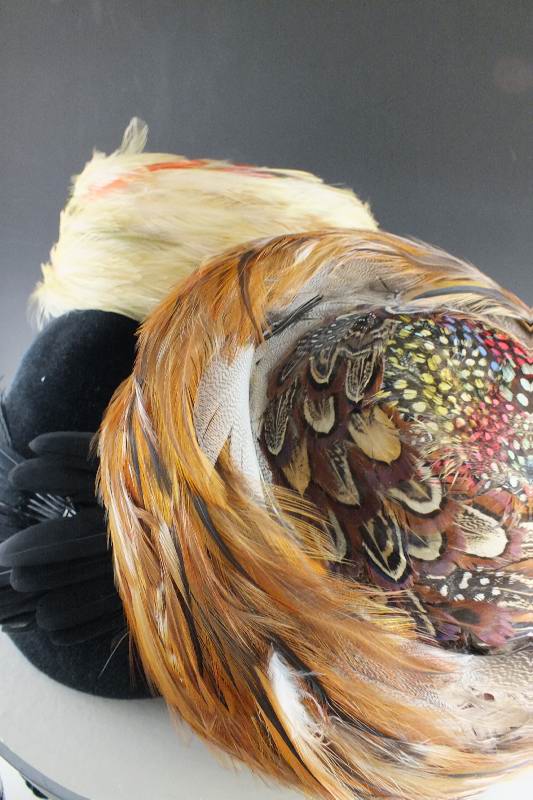 A collection of five vintage pill box style hats