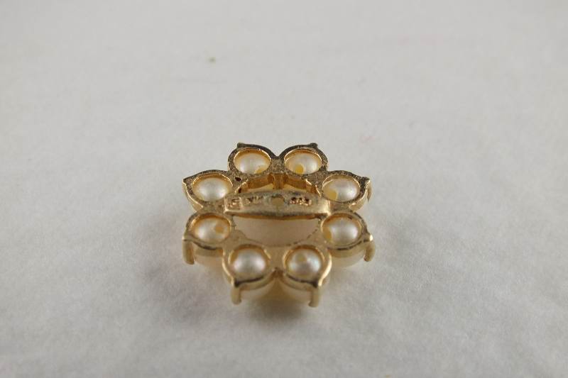 A pair of simulated pearl pierced earrings with removable jackets which are marked 585 14K