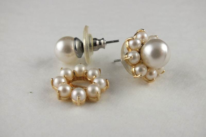 A pair of simulated pearl pierced earrings with removable jackets which are marked 585 14K