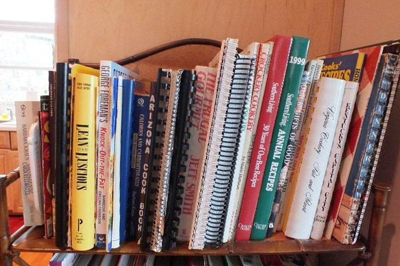 Assorted Collection of Books with Folding Metal Bookcase