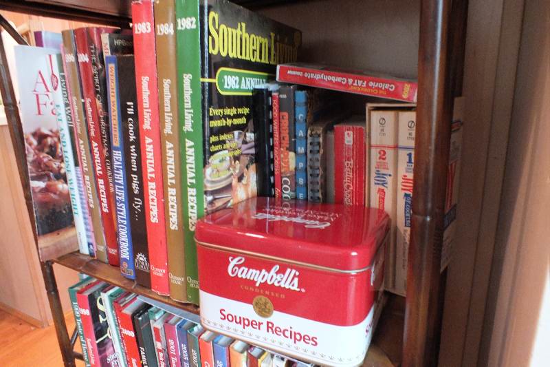 Assorted Collection of Books with Folding Metal Bookcase