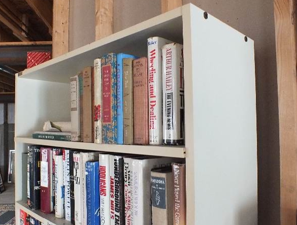 Four white laminate bookcases