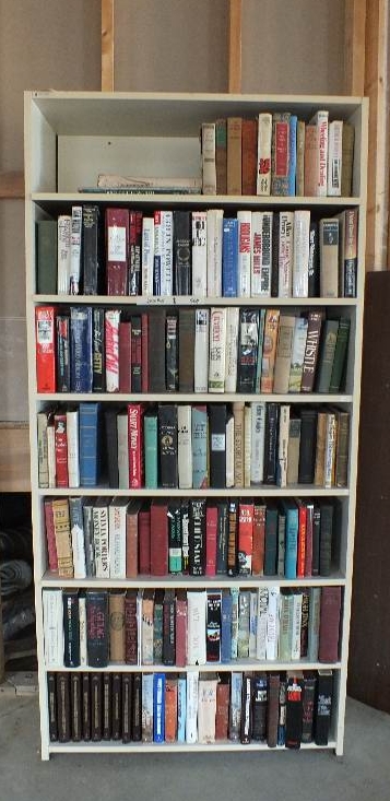Four white laminate bookcases