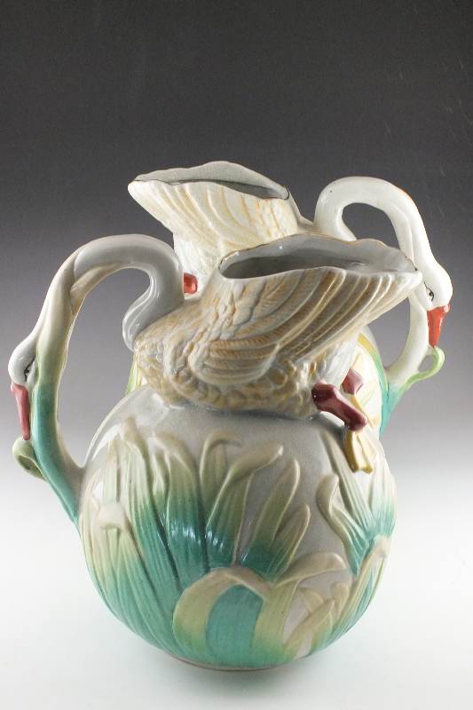 Pair of impressive bird figural pottery pitchers