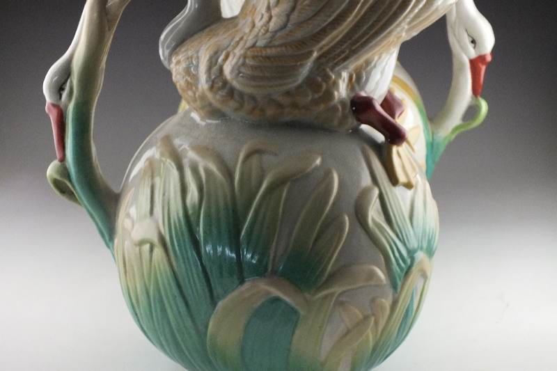 Pair of impressive bird figural pottery pitchers