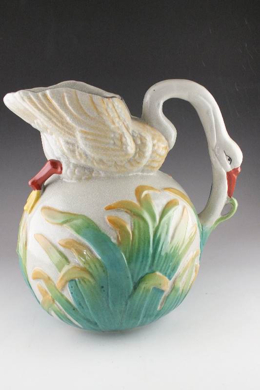 Pair of impressive bird figural pottery pitchers