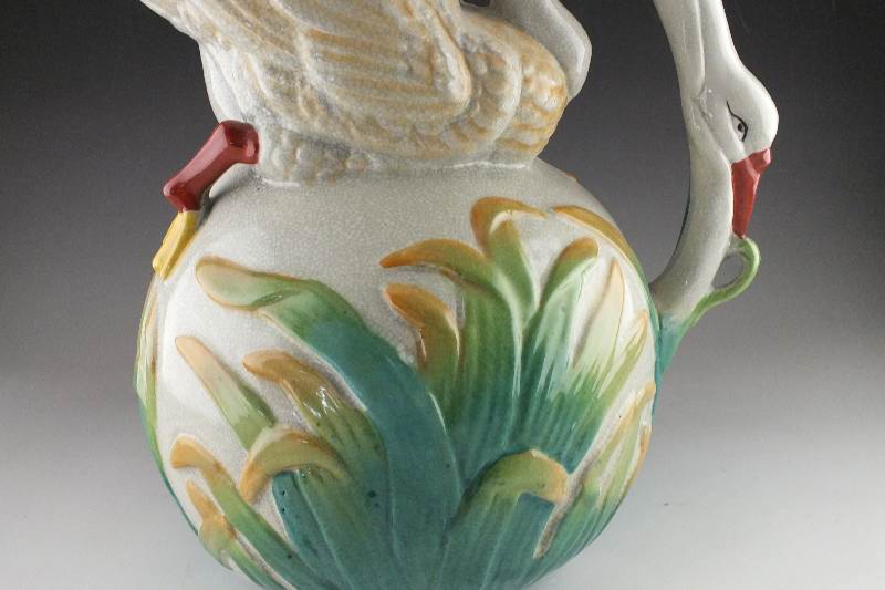 Pair of impressive bird figural pottery pitchers
