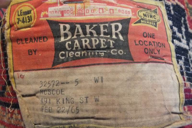 A semi antique hand woven wool and silk oriental style rug