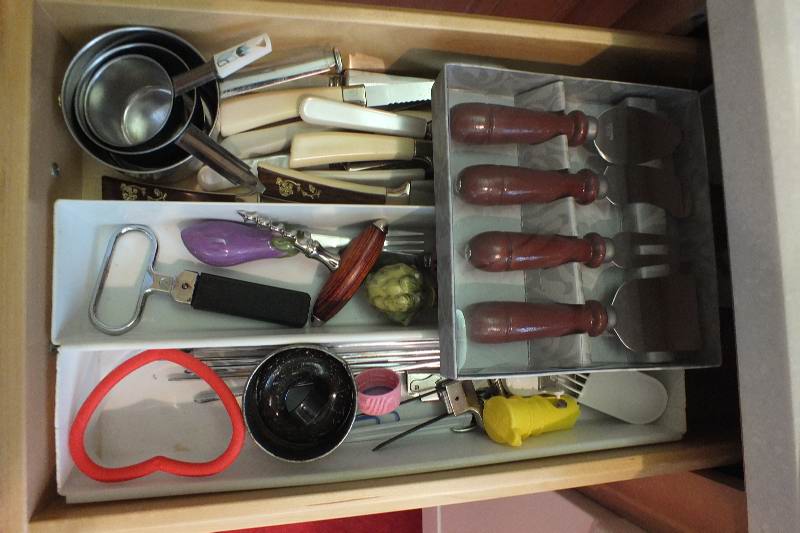 Grouping of Cooking Utensils, Kitchen Gadgets, and Stainless Flatware