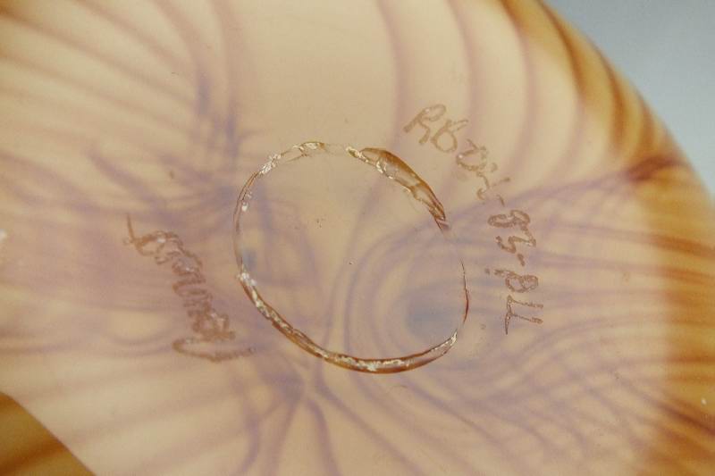 A hand blown art glass vase signed by artist, and dated