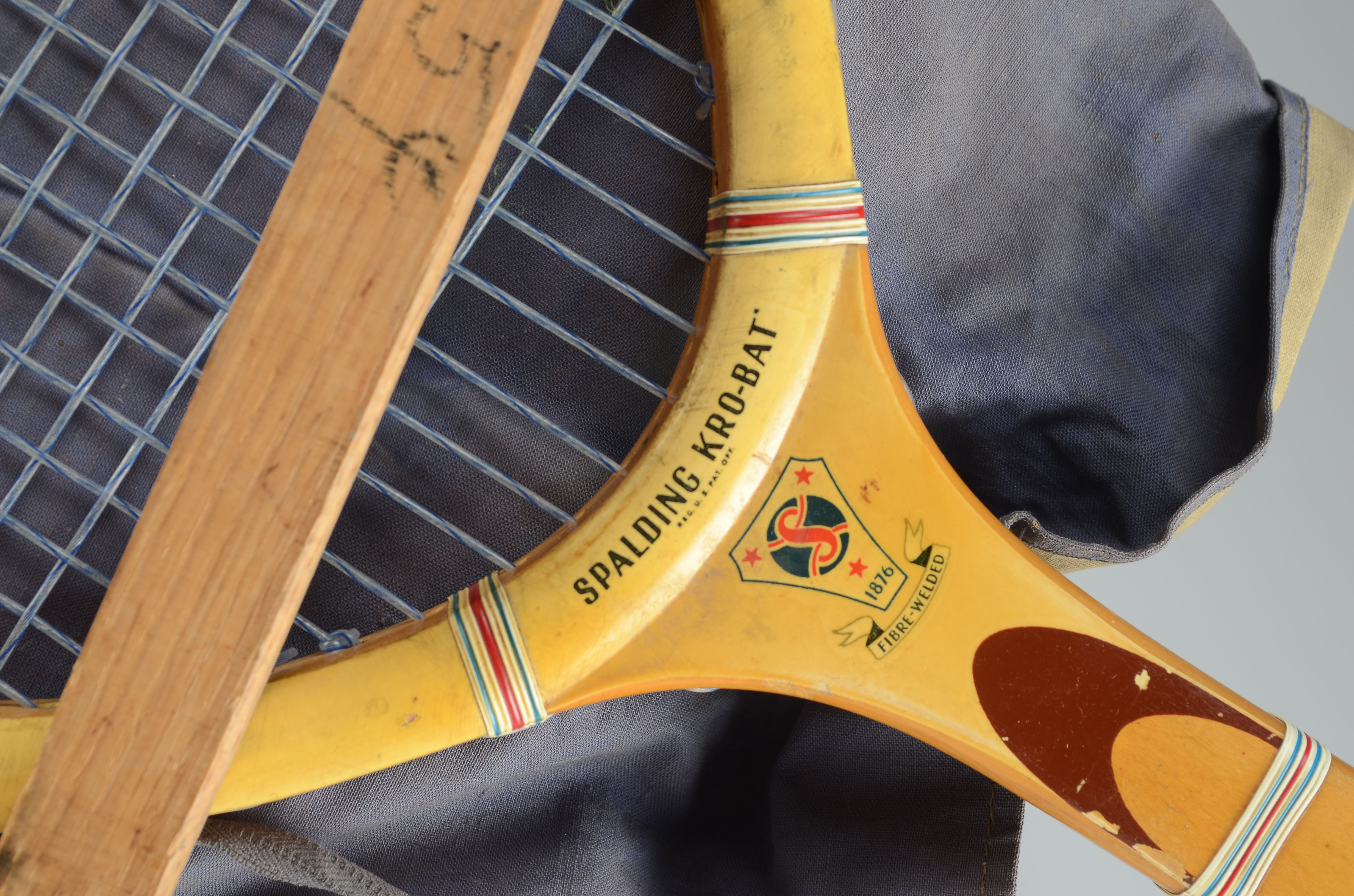 Two vintage wood tennis rackets.