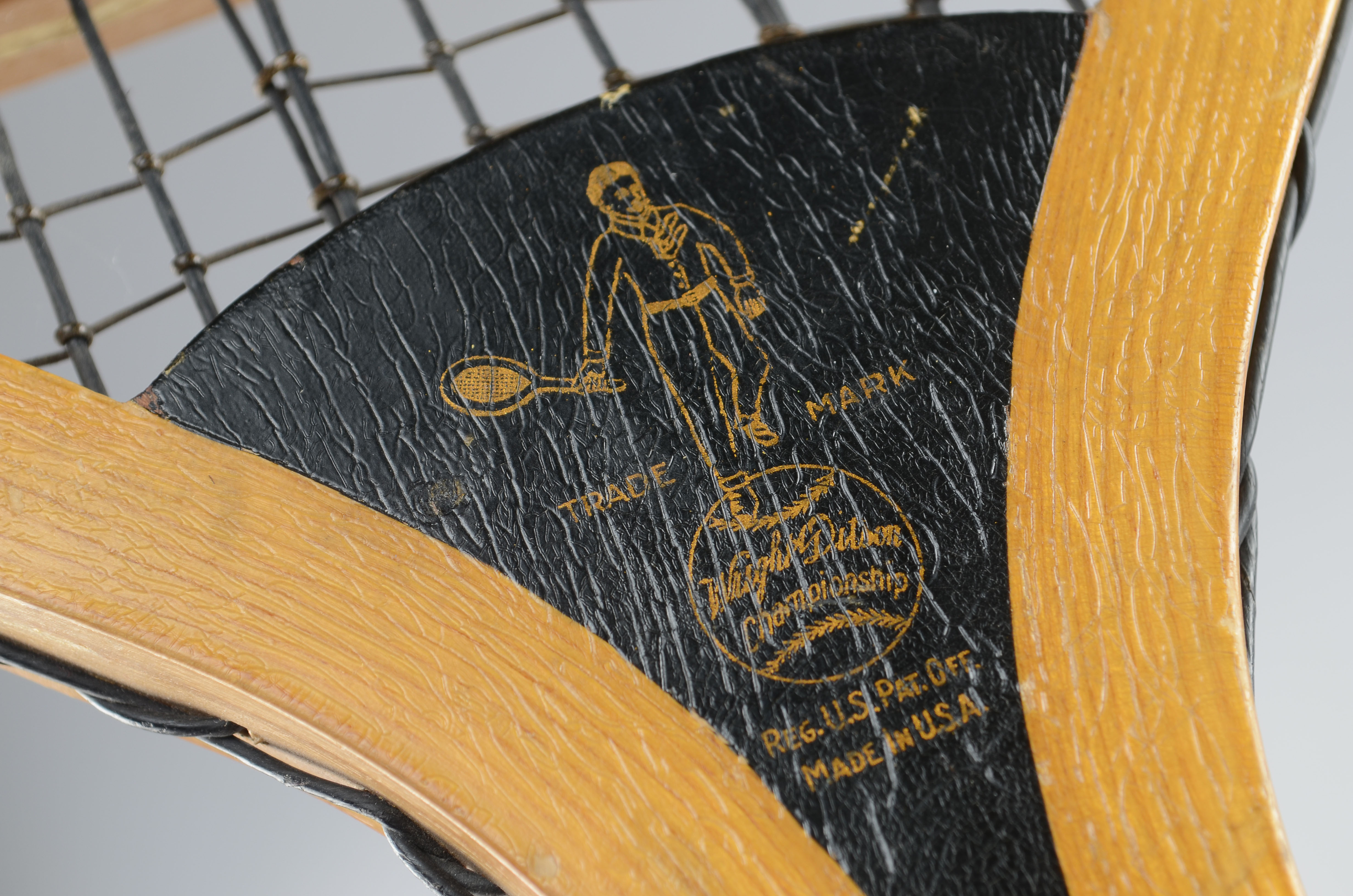 Two vintage wood tennis rackets.