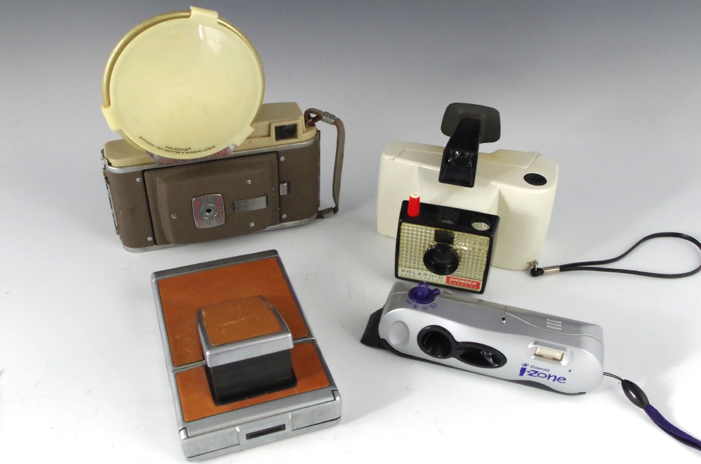 Collection of Vintage and newer Polaroid Cameras