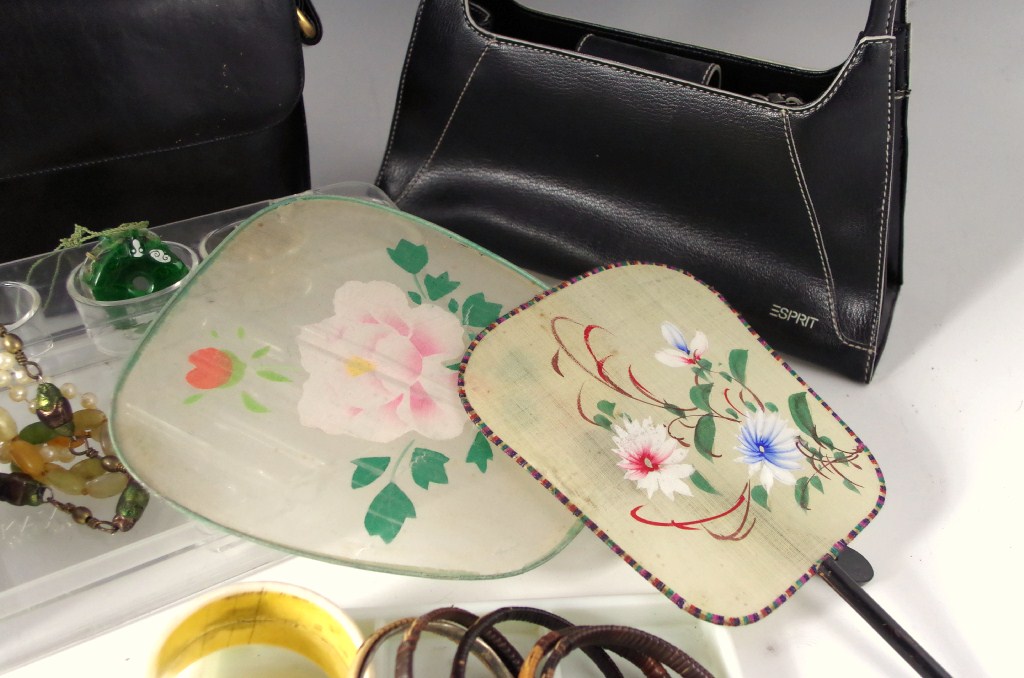 Shelf lot of purses, dresser items,  and jewelry