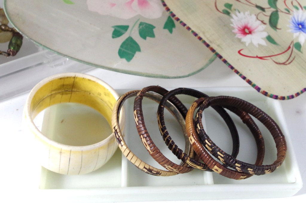 Shelf lot of purses, dresser items,  and jewelry