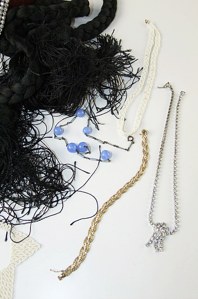 A random lot of vintage jewelry and accessories 