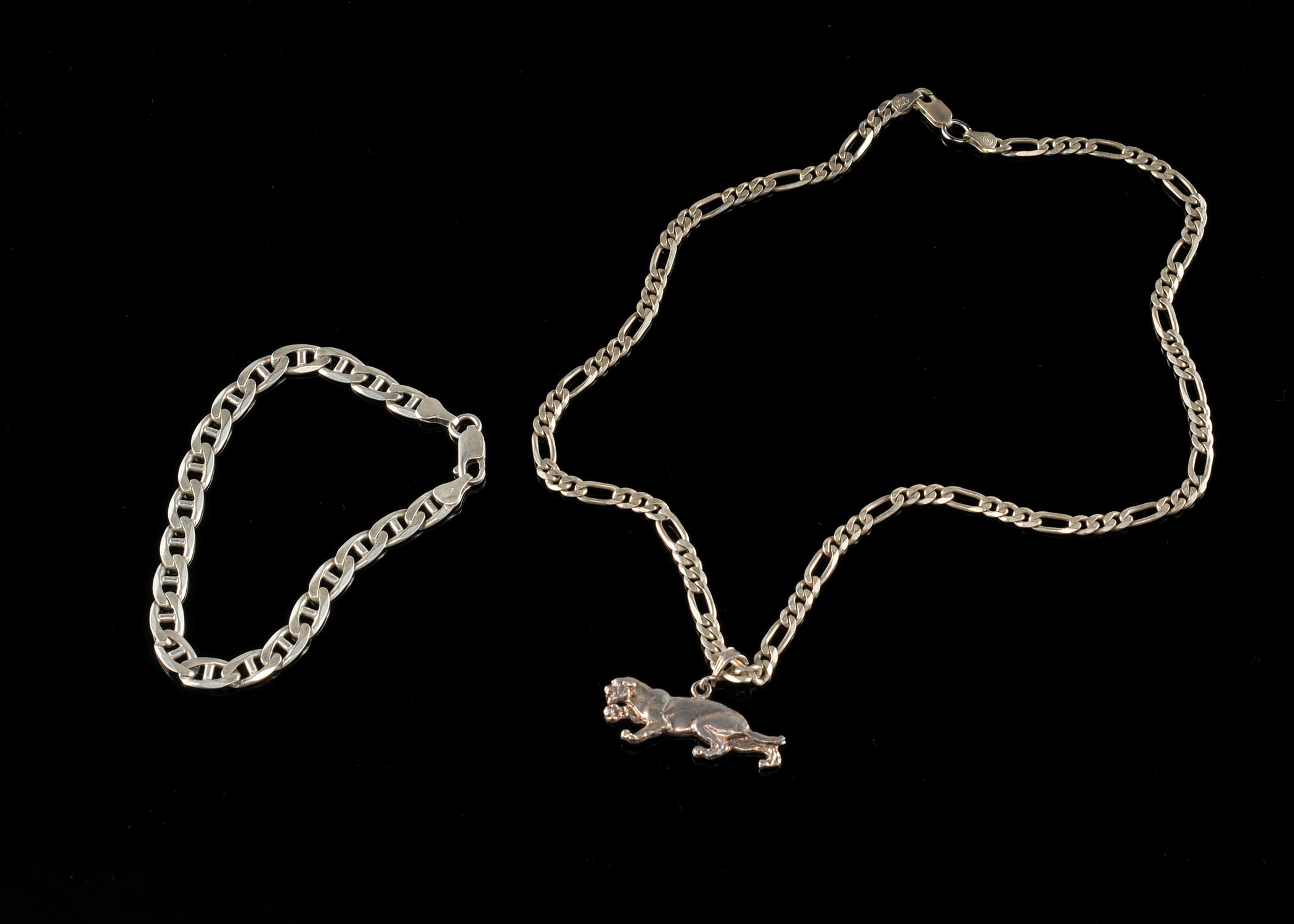 A sterling silver link necklace with a cast sterling silver panther pendant and a sterling silver link braclet