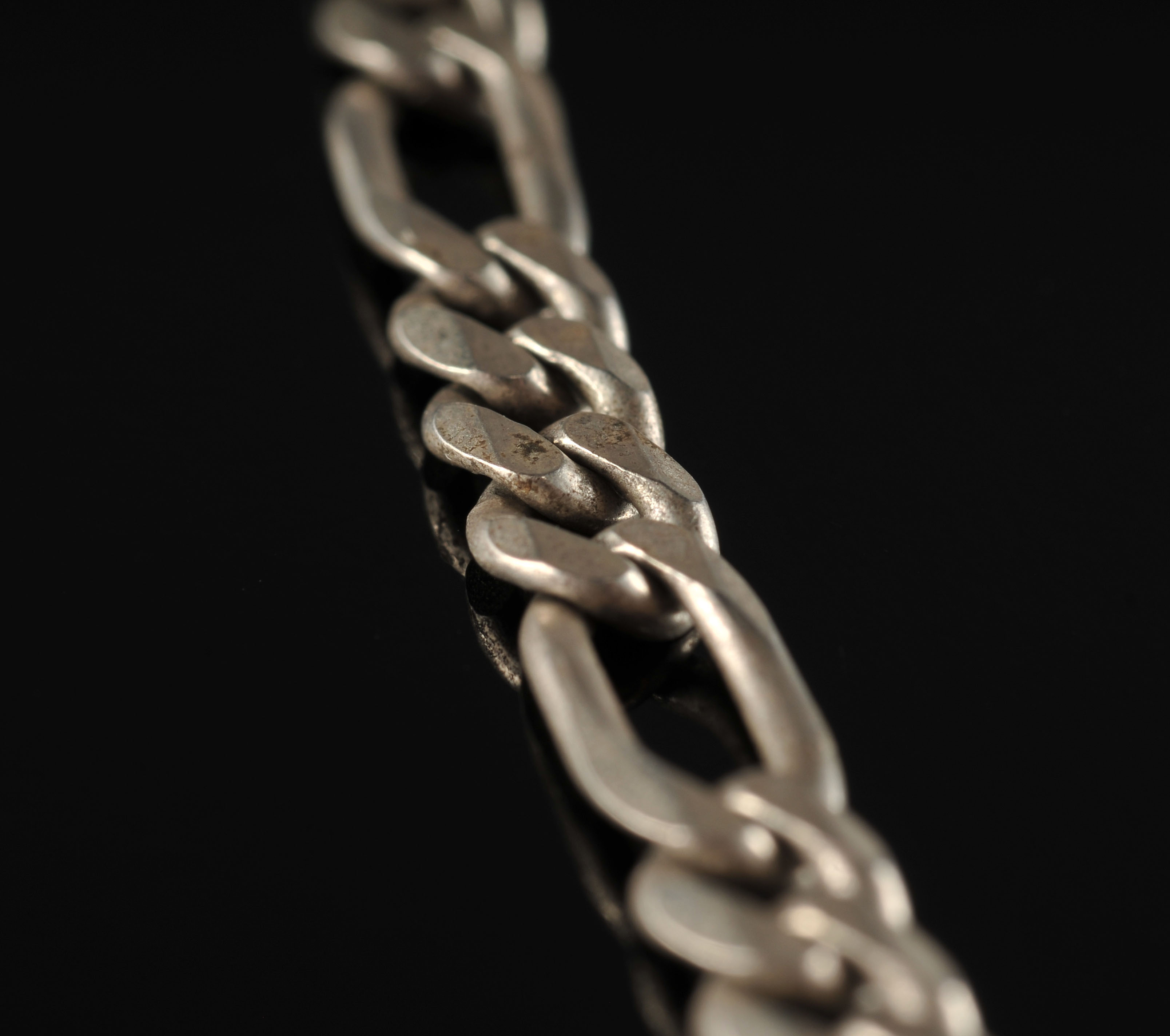 A sterling silver link necklace with a cast sterling silver panther pendant and a sterling silver link braclet