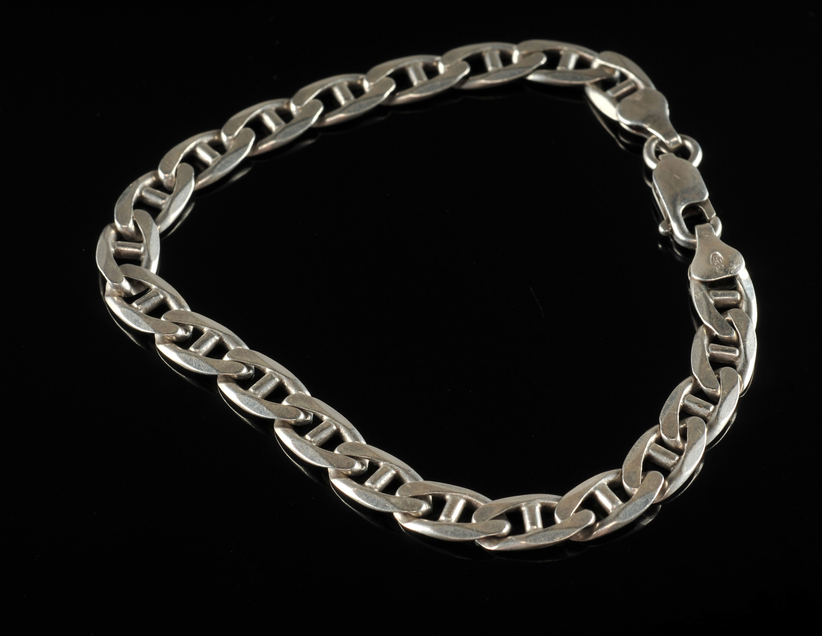 A sterling silver link necklace with a cast sterling silver panther pendant and a sterling silver link braclet