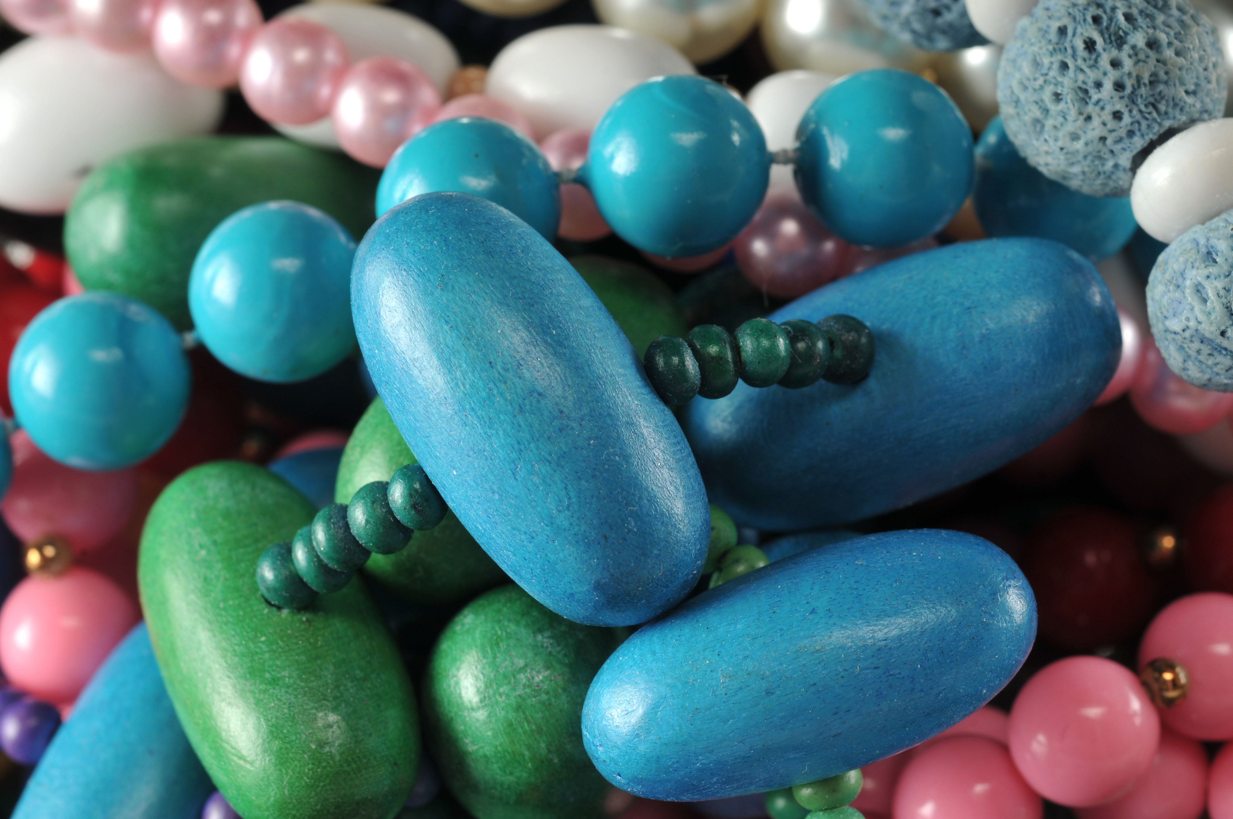 Two gallon size bags full of vintage costume jewelry