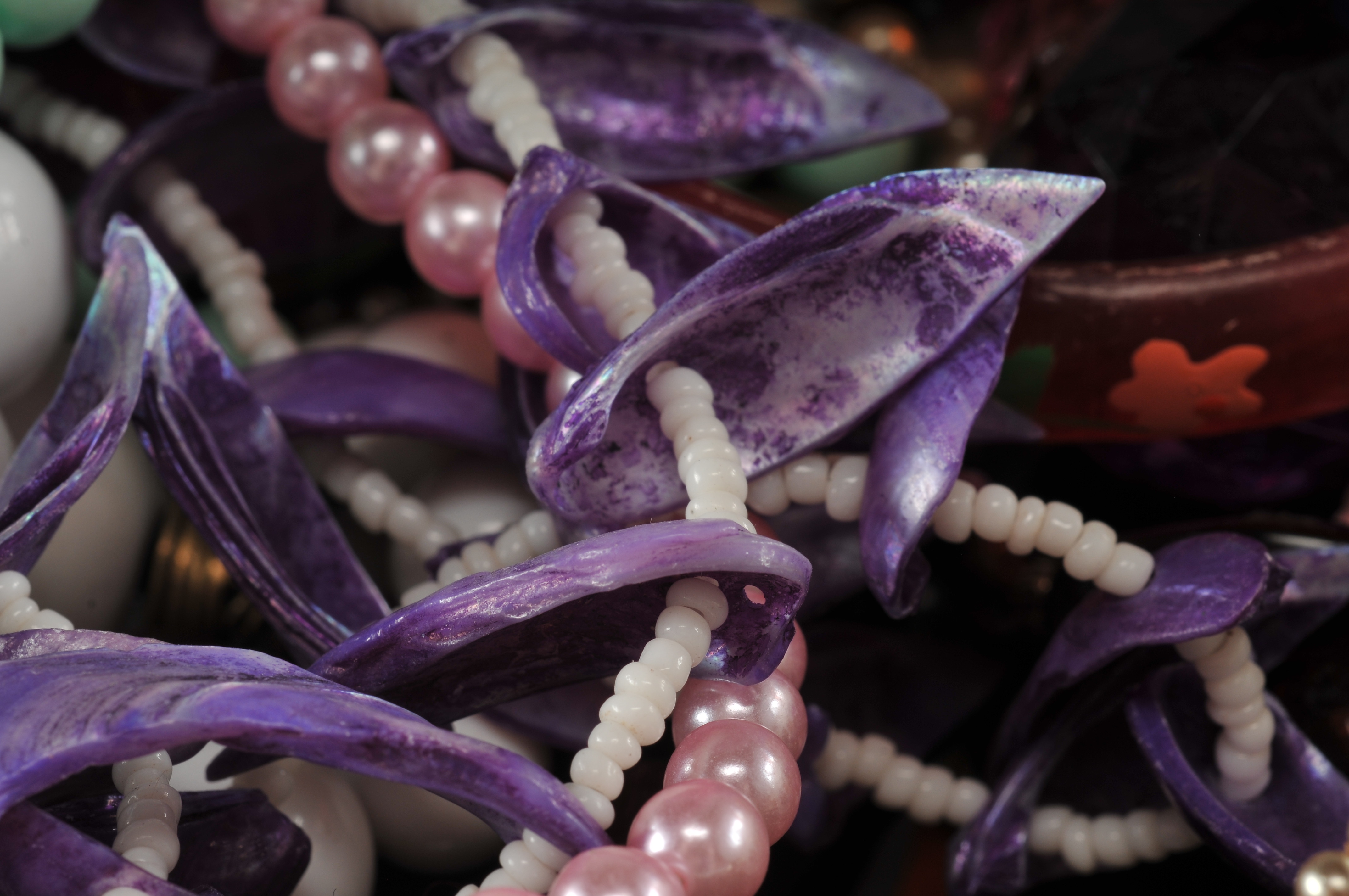 Two gallon size bags full of vintage costume jewelry