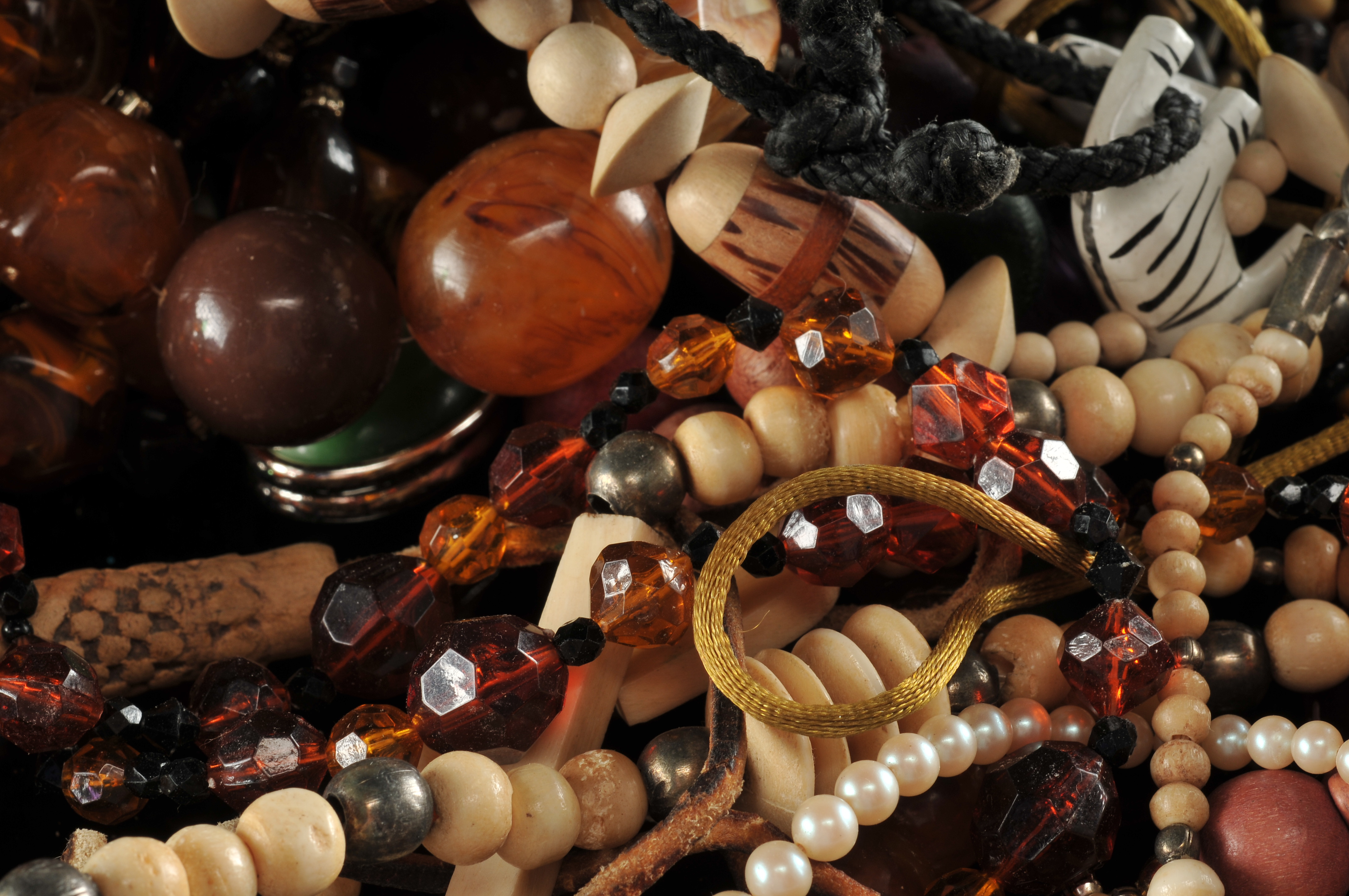 Two gallon size bags full of vintage costume jewelry