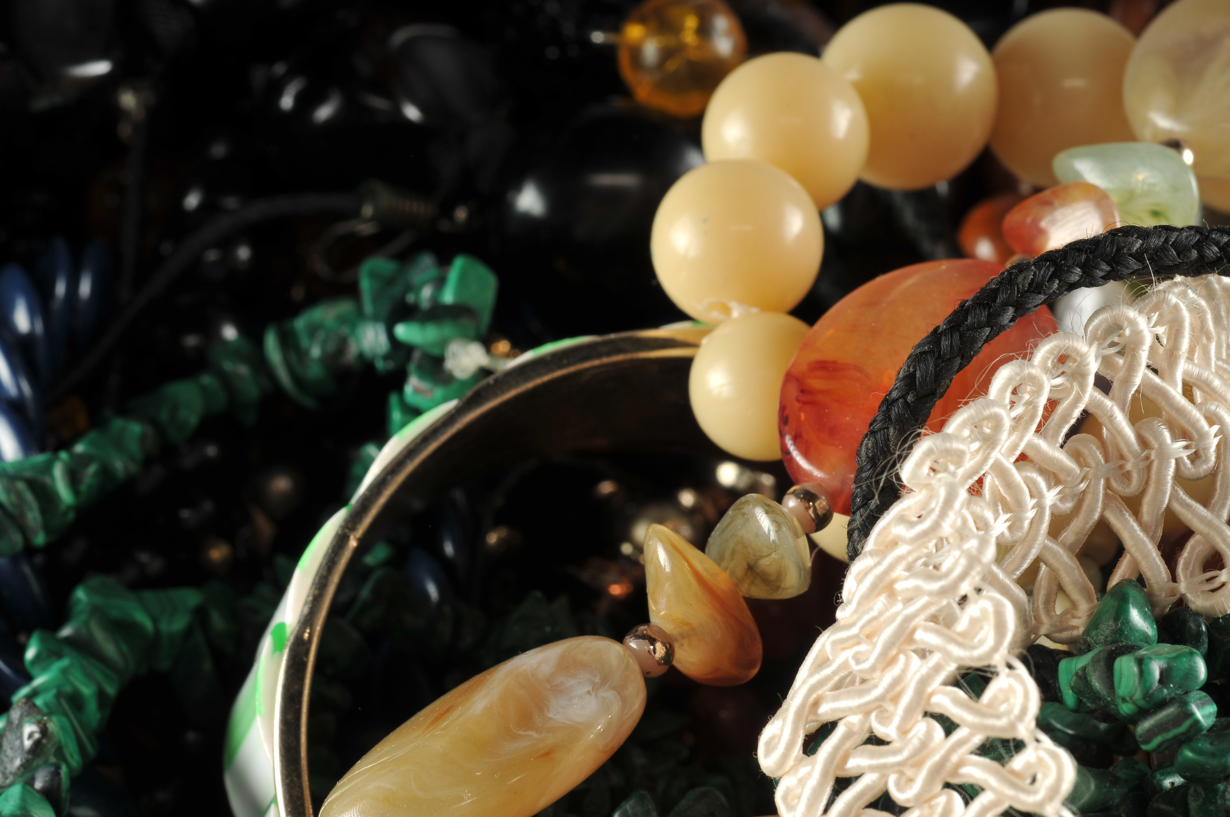 Two gallon size bags full of vintage costume jewelry