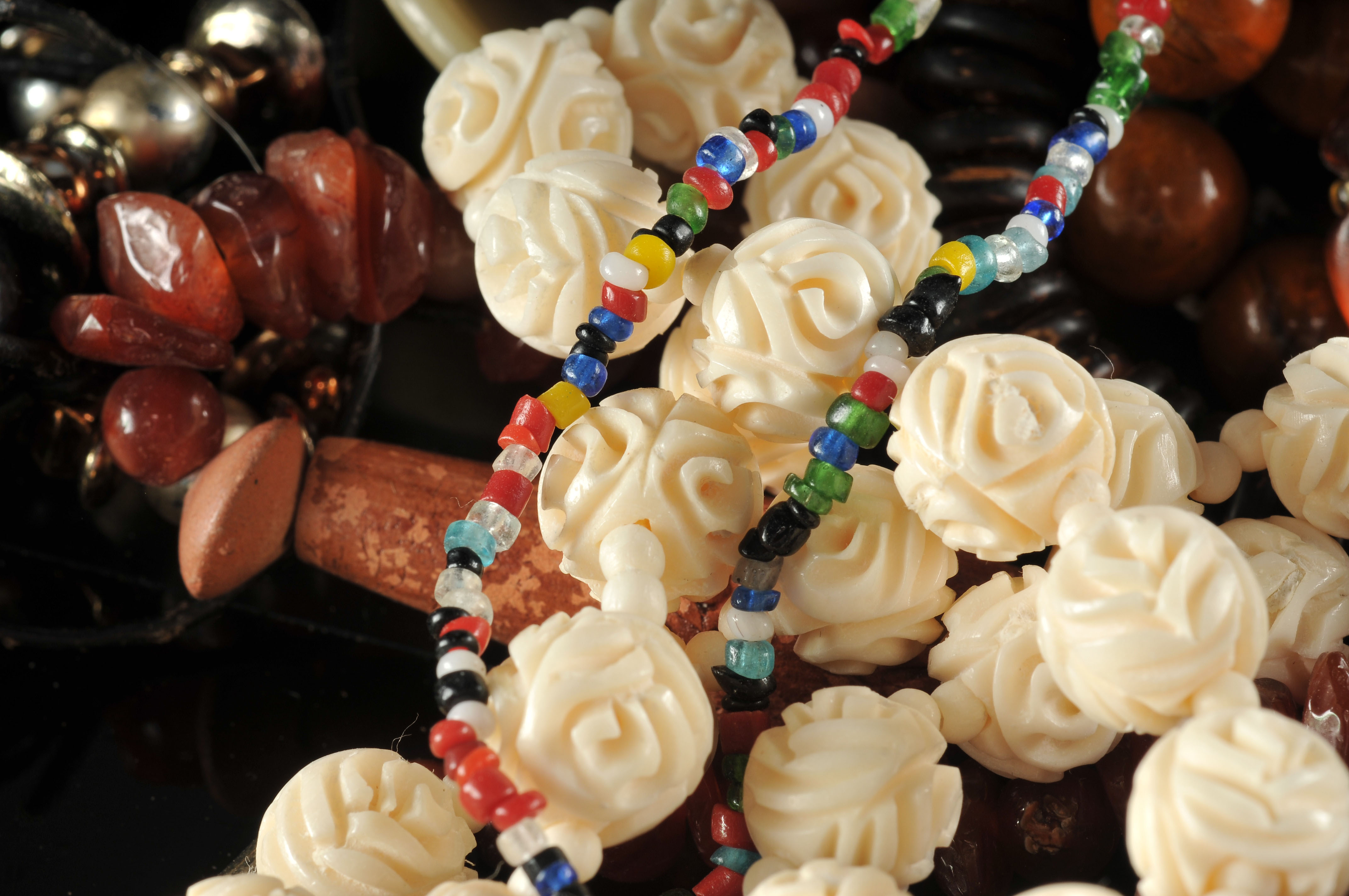 Two gallon size bags full of vintage costume jewelry