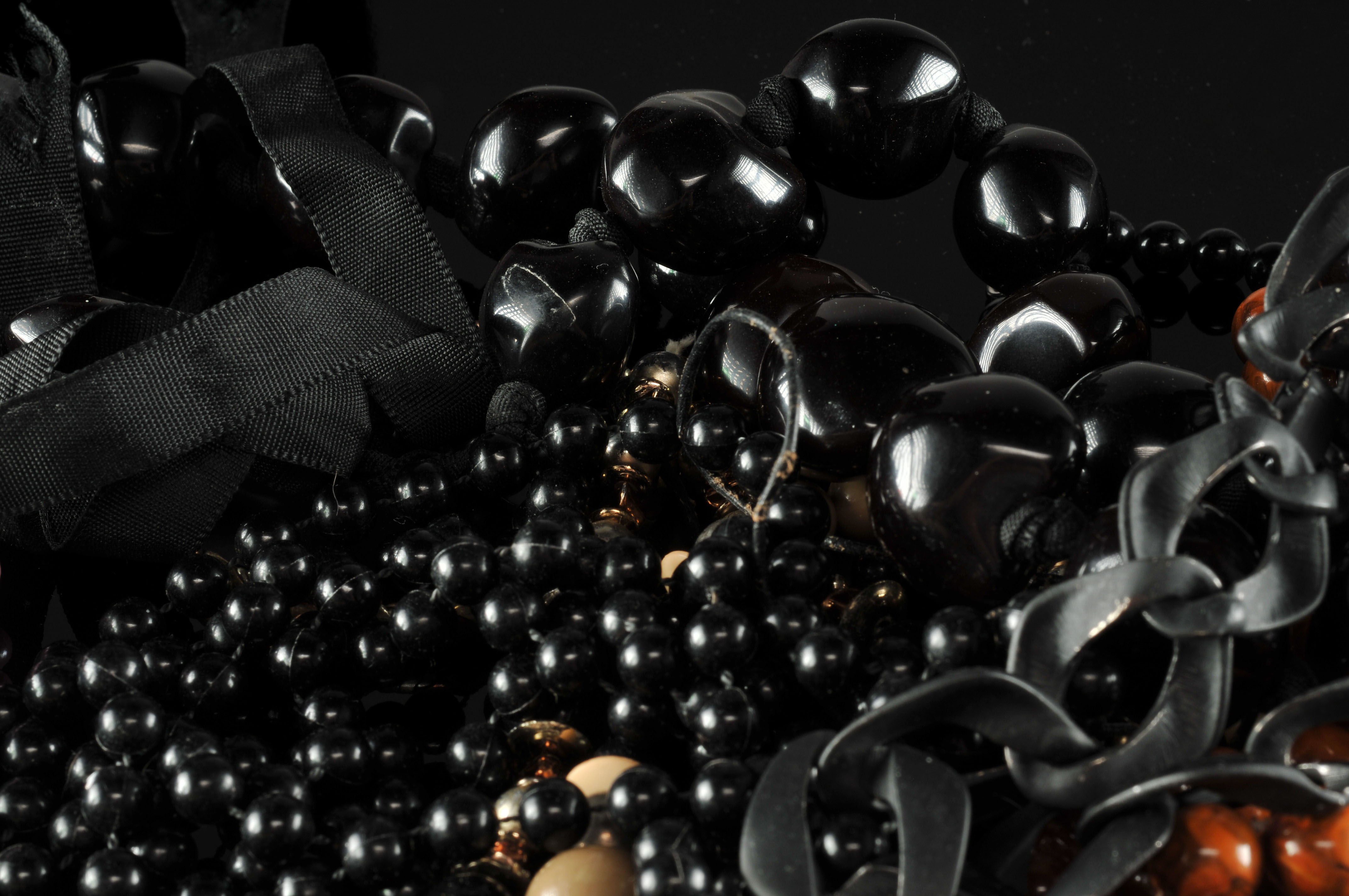 Two gallon size bags full of vintage costume jewelry