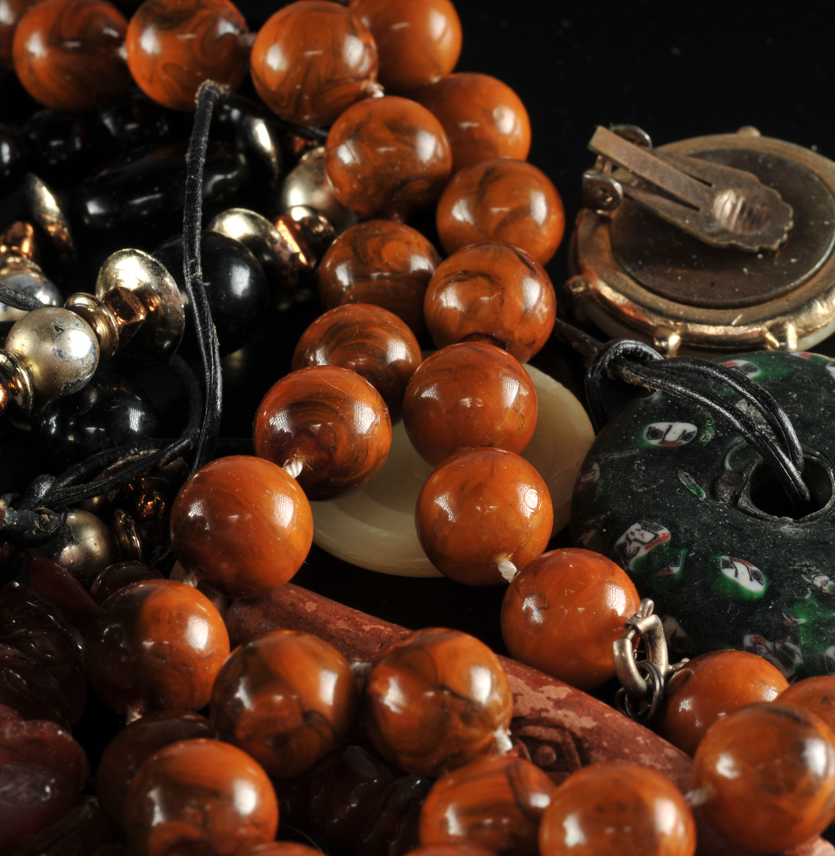 Two gallon size bags full of vintage costume jewelry