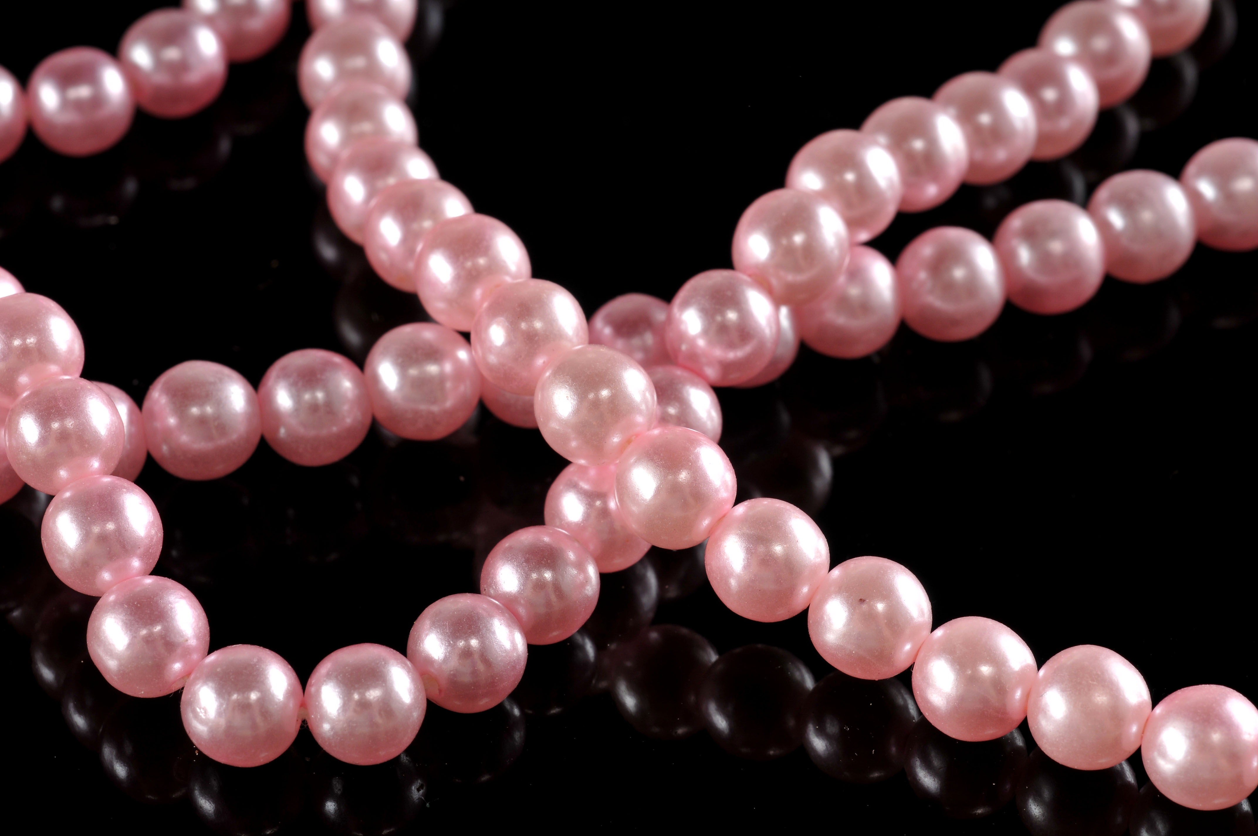 Two gallon size bags full of vintage costume jewelry