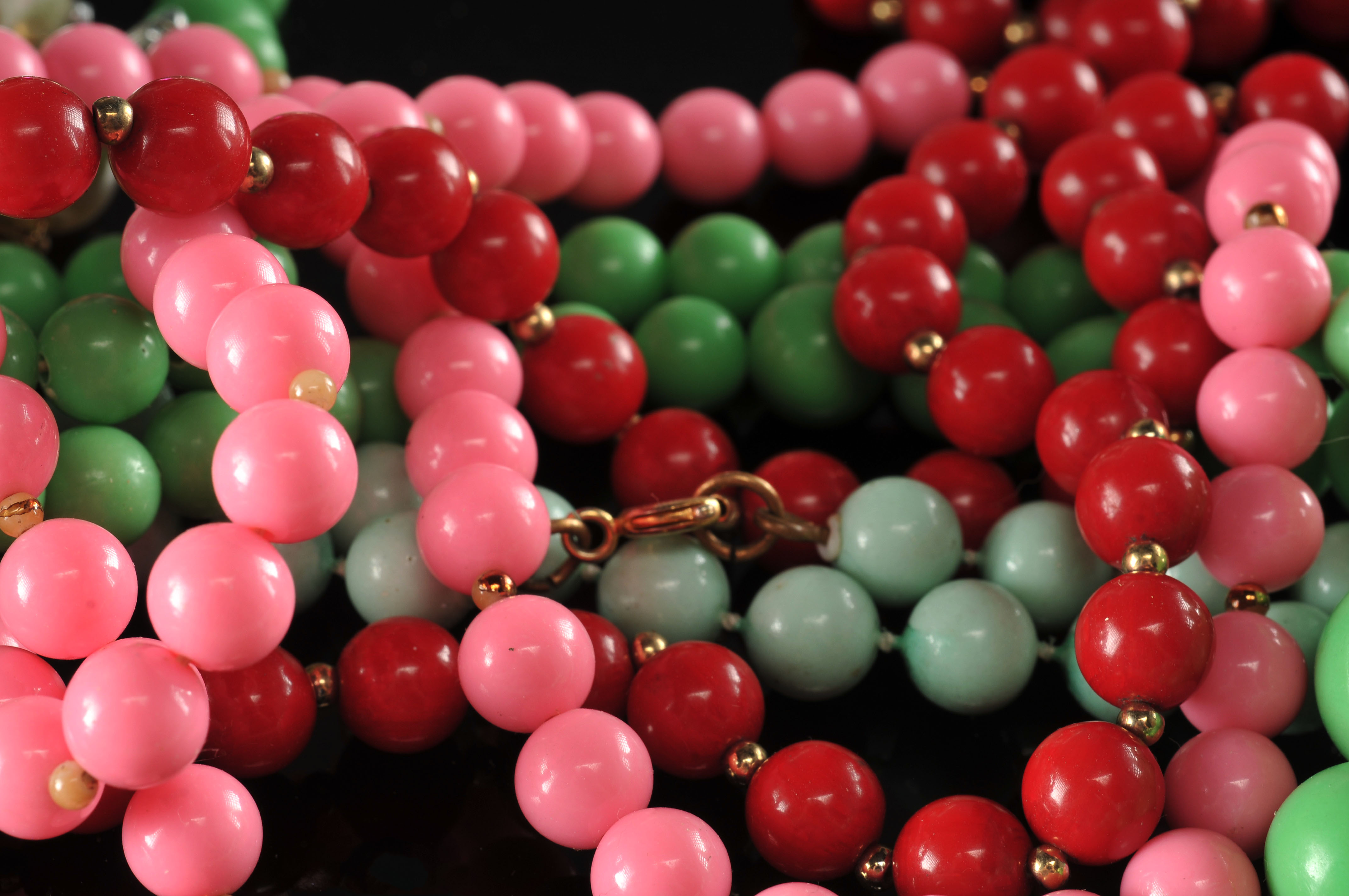 Two gallon size bags full of vintage costume jewelry