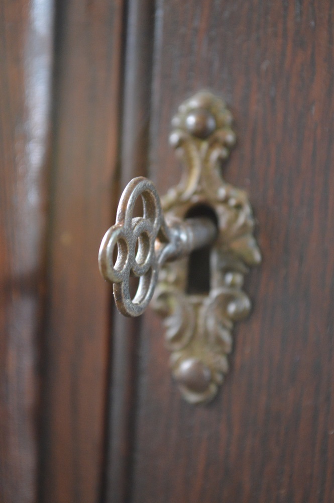 Antique Curio Cabinet with Oval Curved Glass