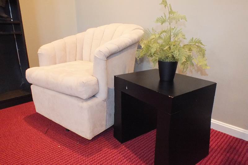 Swivel shell backed chair and end table