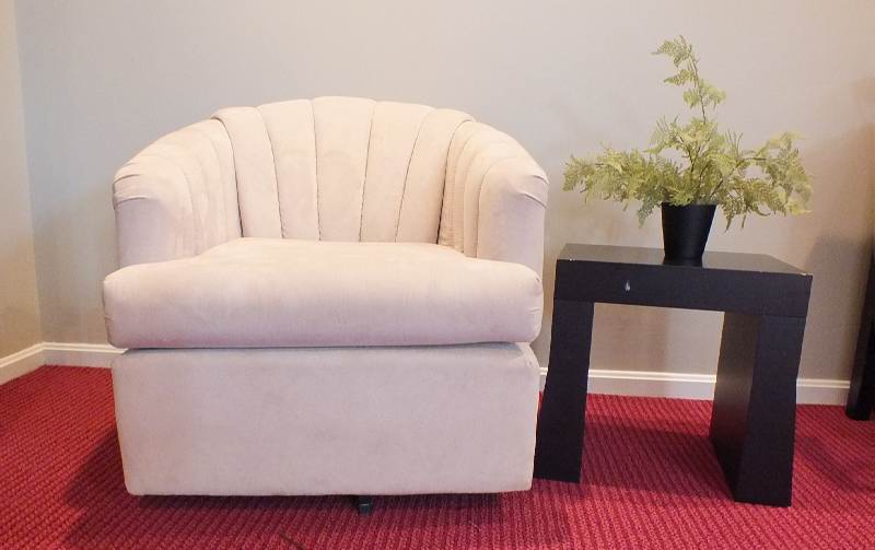 Swivel shell backed chair and end table
