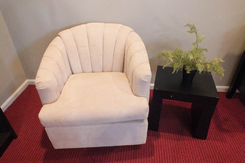 Swivel shell backed chair and end table