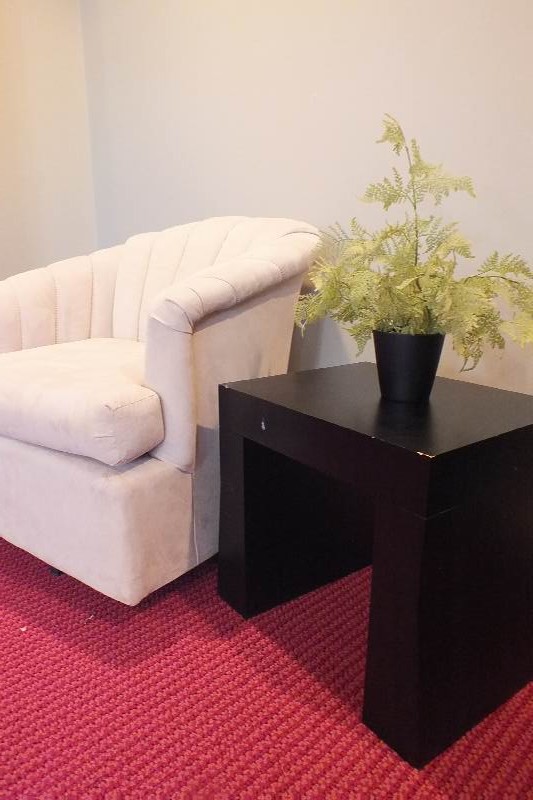 Swivel shell backed chair and end table