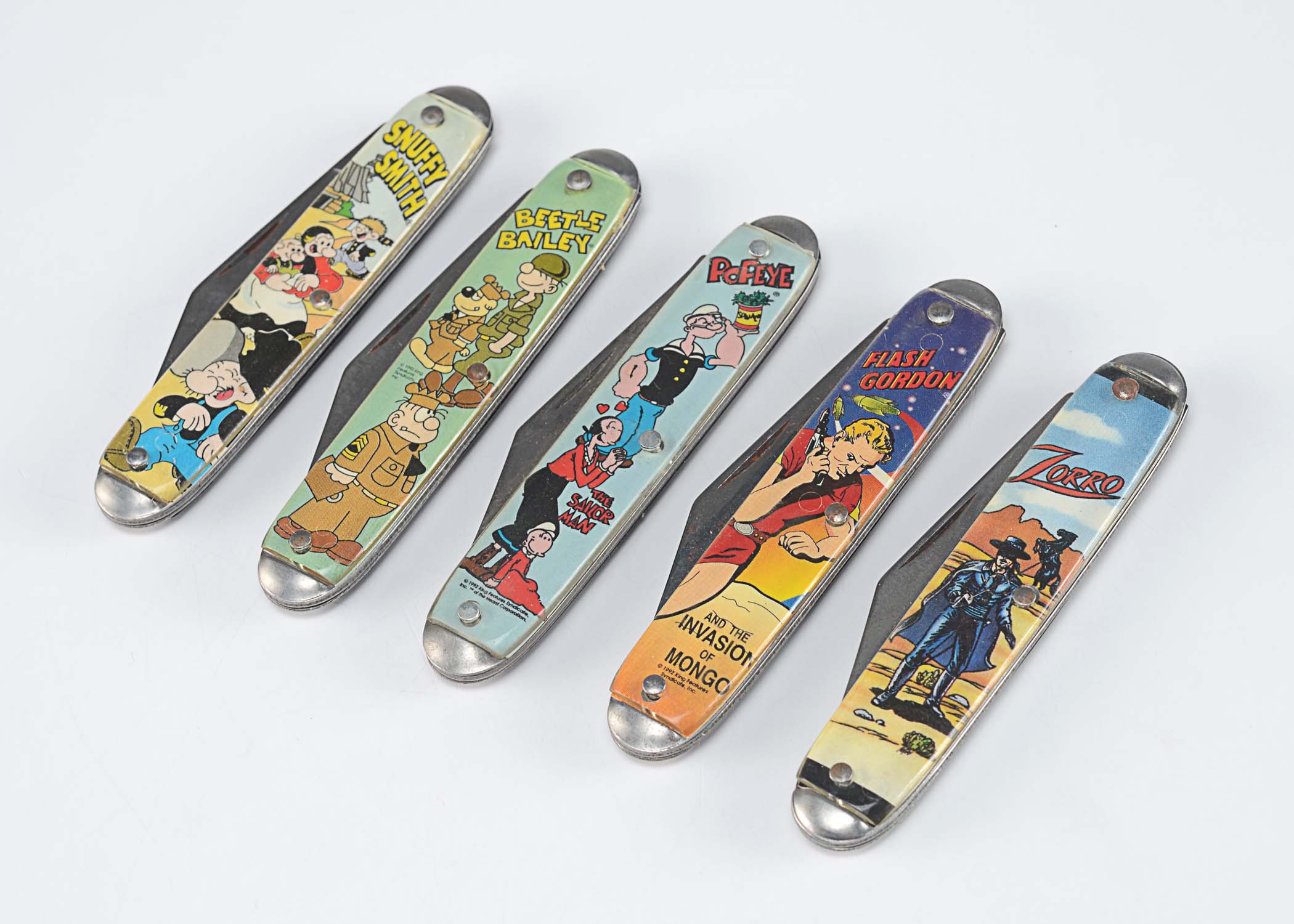 Comics themed vintage pocket knives