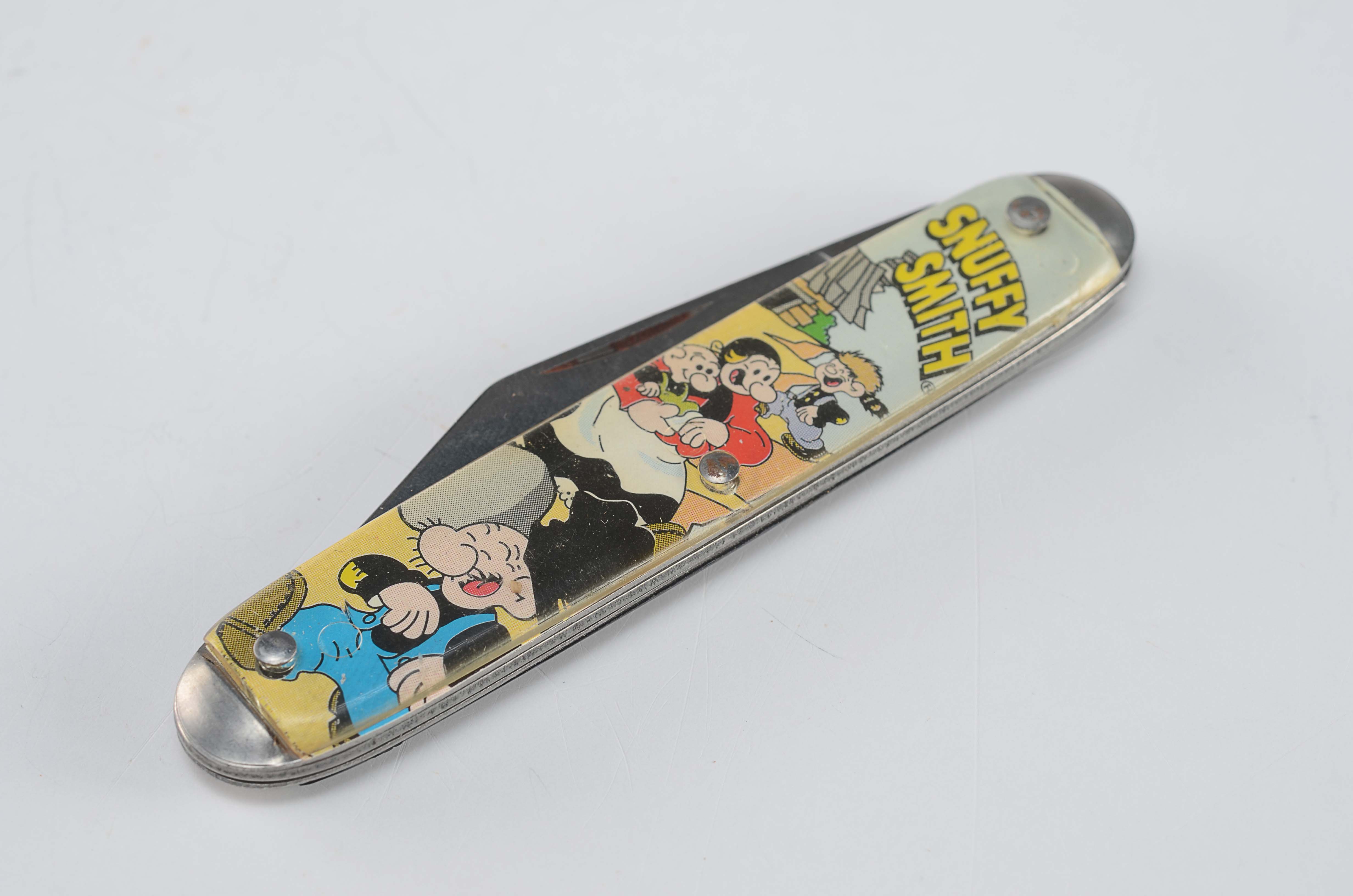 Comics themed vintage pocket knives