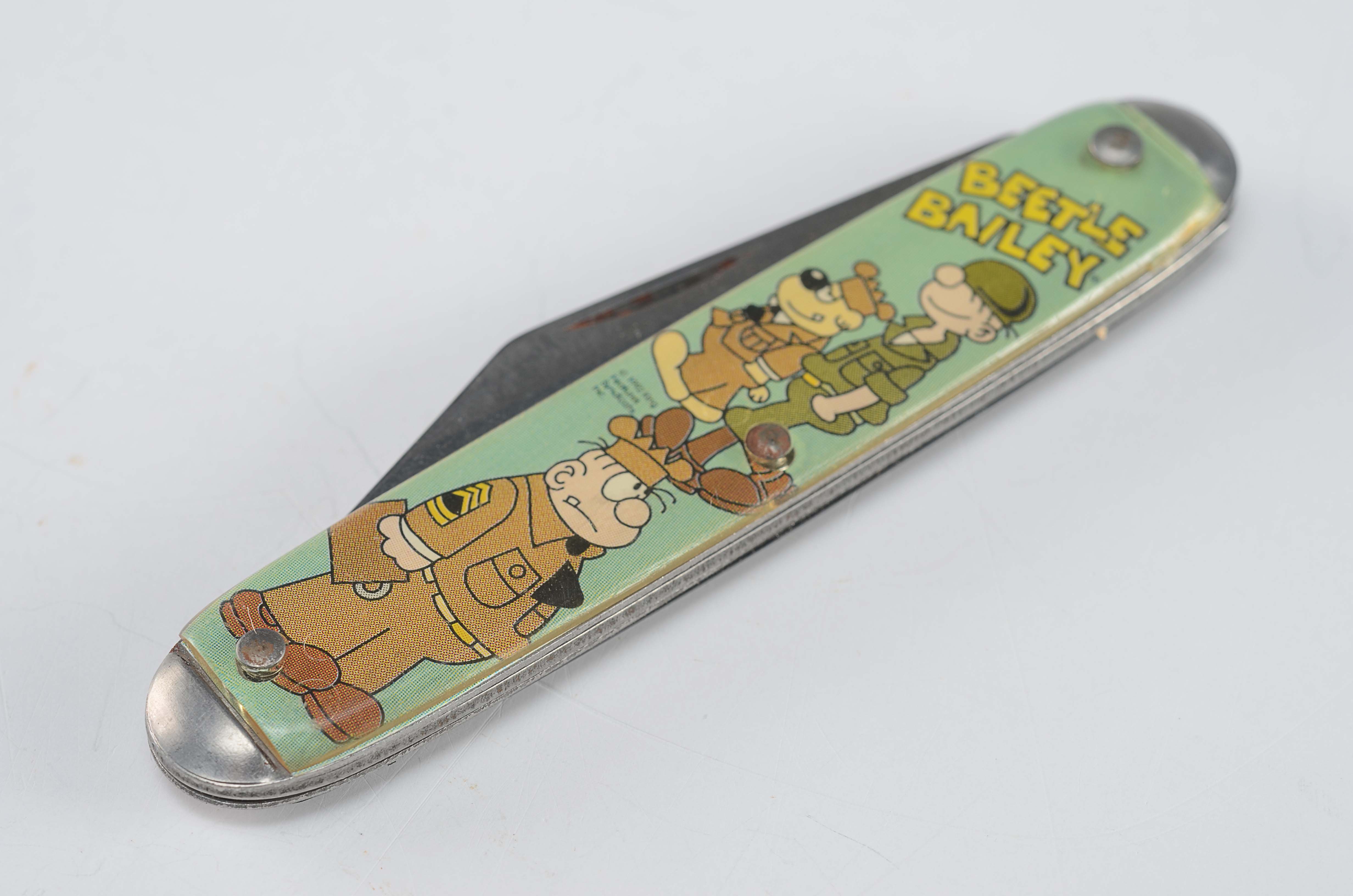 Comics themed vintage pocket knives