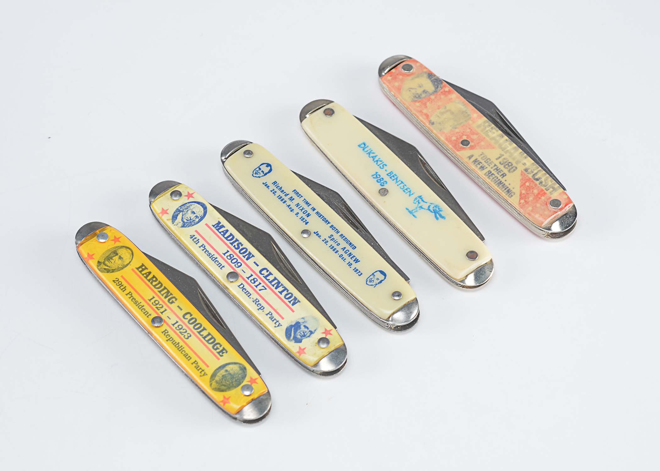 Politically themed vintage pocket knives