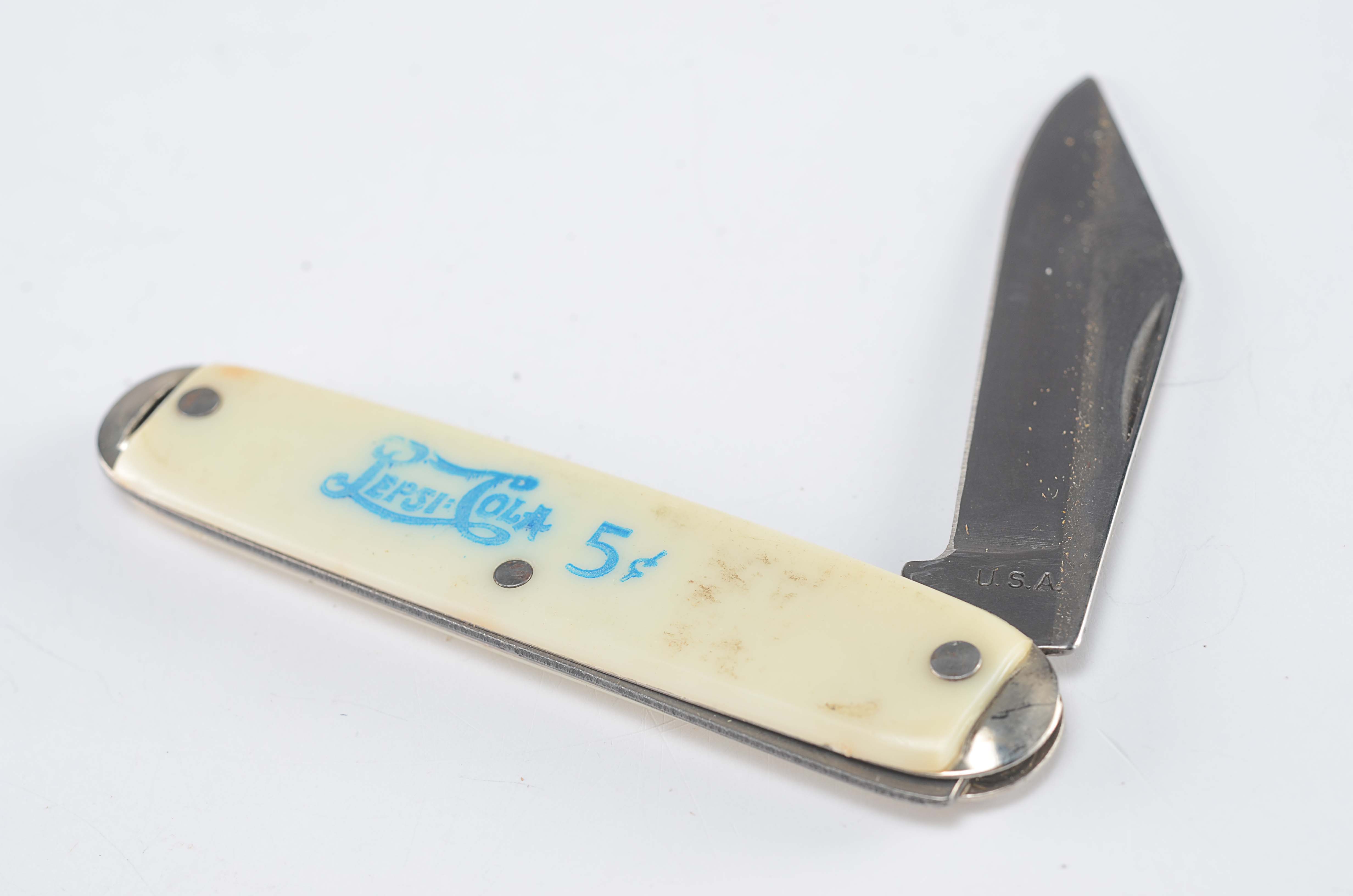 Various themed vintage pocket knives