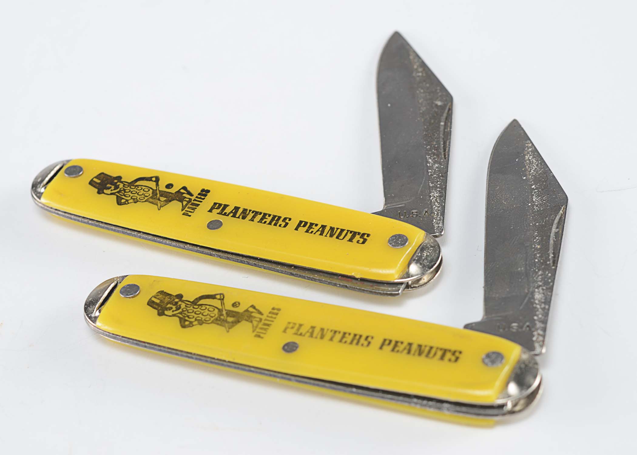 Advertising themed vintage pocket knives
