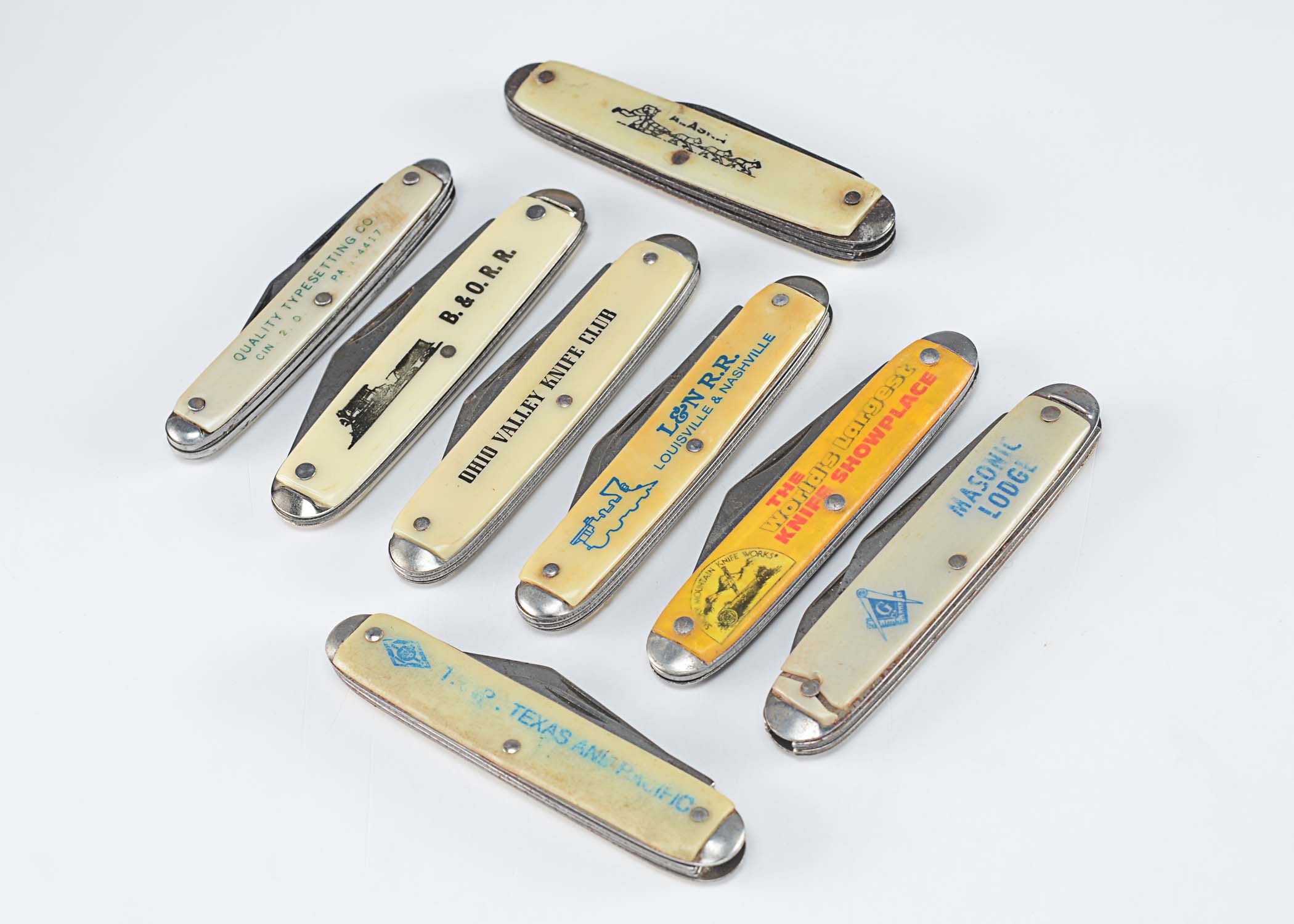 Various themed vintage pocket knives