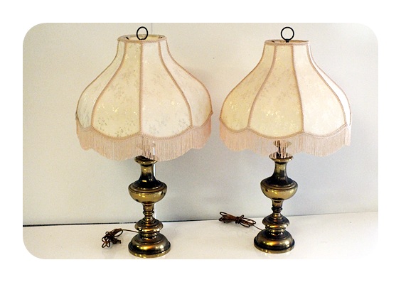 Pair of heavy brass toned table lamps with fancy Victorian style shades
