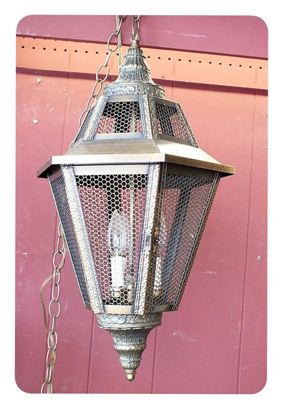 Modern hanging lamp with pierced screen design